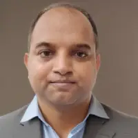 Dr. Ajit Ashok Muzumdar